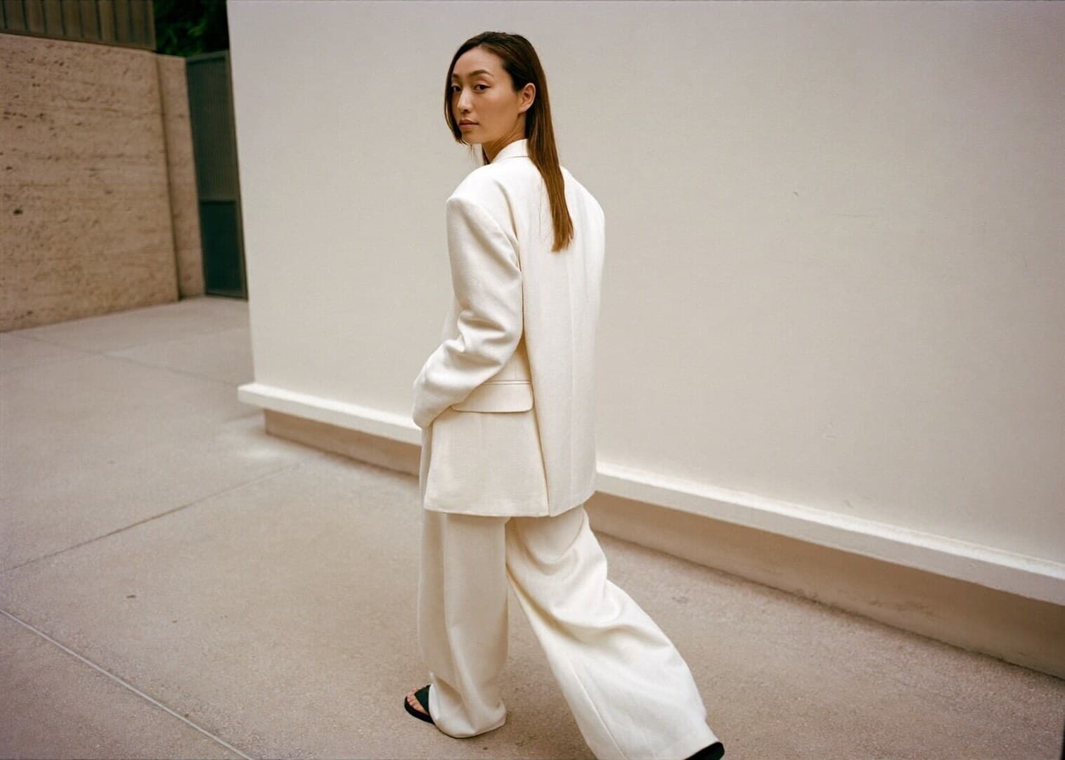 Model in the Lume Linen Blazer and Vate Wide Trousers